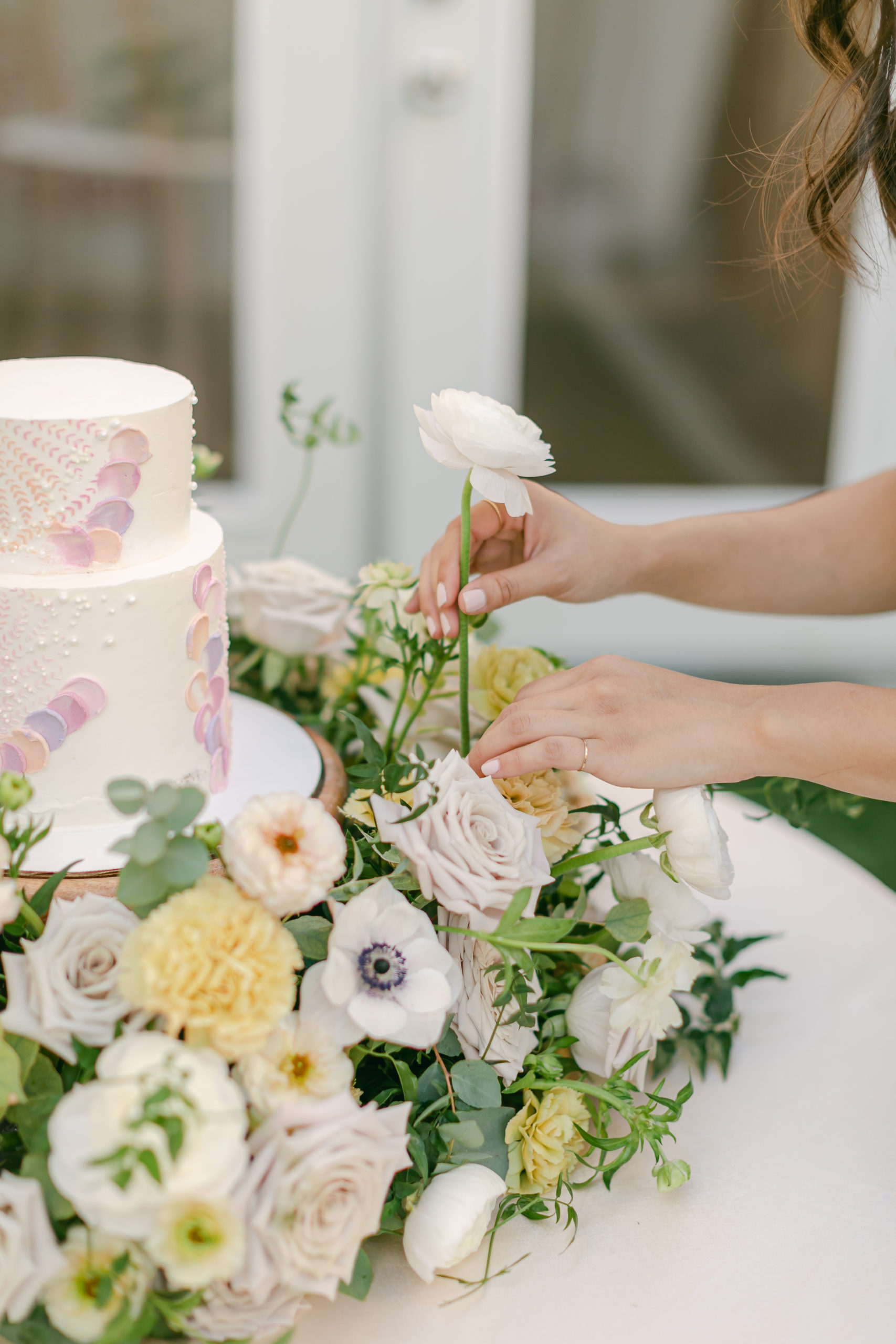 cake with springtime wedding flowers