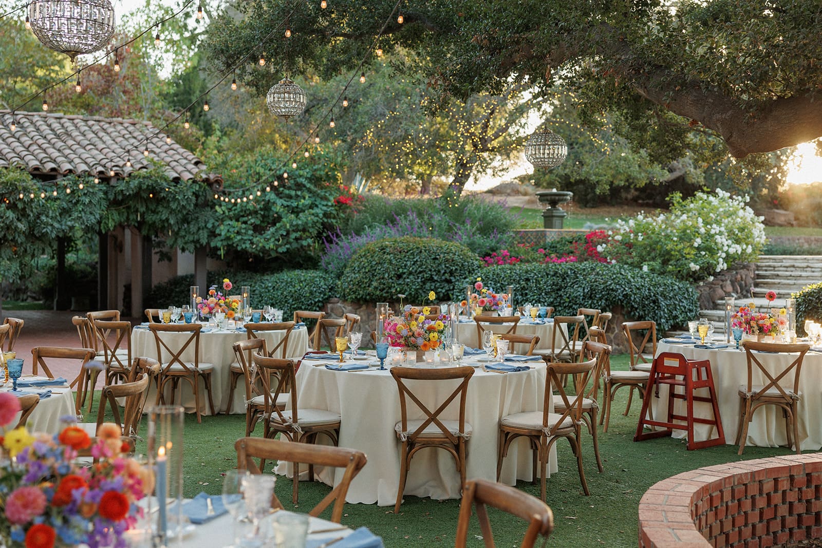 Quail Ranch wedding reception with colorful floral centerpieces
